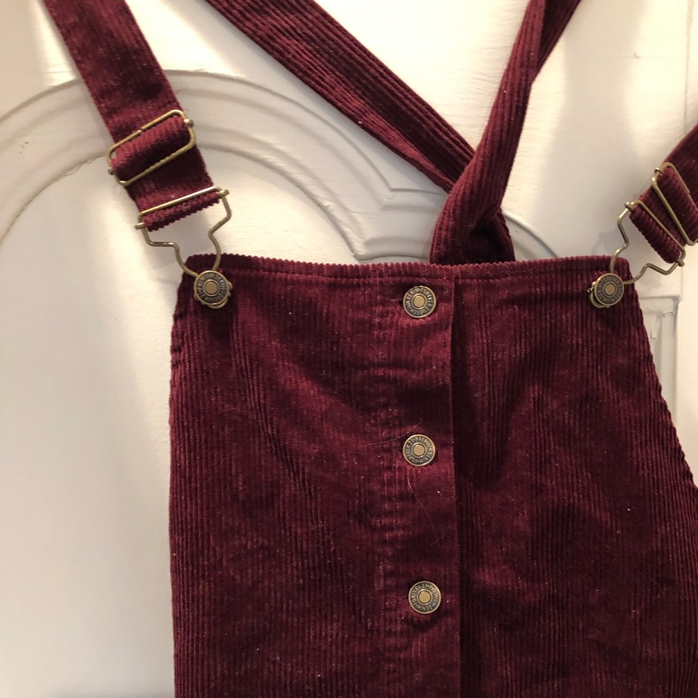 Springy burgundy overalls